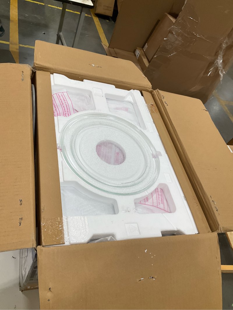 Condition photo showing Good Condition for ge® 1.4 cu. ft. countertop microwave oven 1.4 cu.ft. white