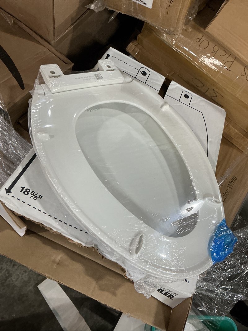 Condition photo showing New/Like New for KOHLER 20110-0 Brevia, Slow Close Toilet Seat, Elongated Toilet Seat, Grip-Tight Bumpers Quick-Attach Hardware, White White Elongated Quiet-Close