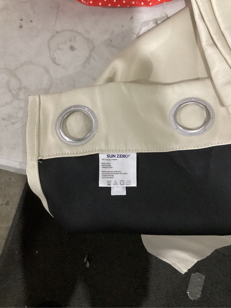 Condition photo showing As Is for sunzero blackout curtains cream