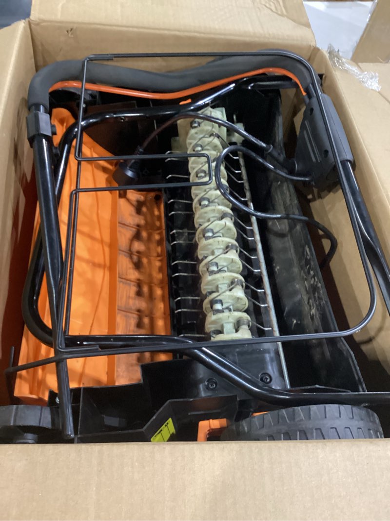 Condition photo showing As Is for lawnmaster gvb1316 electric 16” 13 amp dethatcher and scarifier with 12 gallon collection bag 16-inch