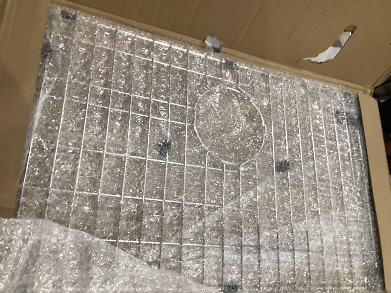 Condition photo showing New/Like New for kitchen sink grid and sink protectors, stainless steel sink grids for bottom of kitchen sinks, 26" x 14" with rear drain for single bowl sinks 26" x 14 1/16"