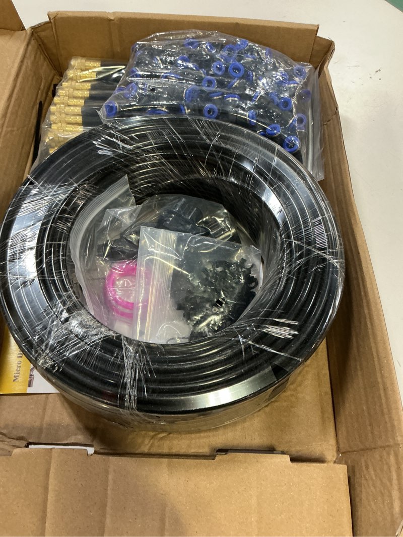 Condition photo showing New/Like New for drip irrigation system, 2026-upgrade 200ft 1/4" garden watering system with 40 pcs 360° adjustable copper nozzles, diy kit for garden, lawn, greenhouse, raised beds & outdoor plants 200ft/40pcs