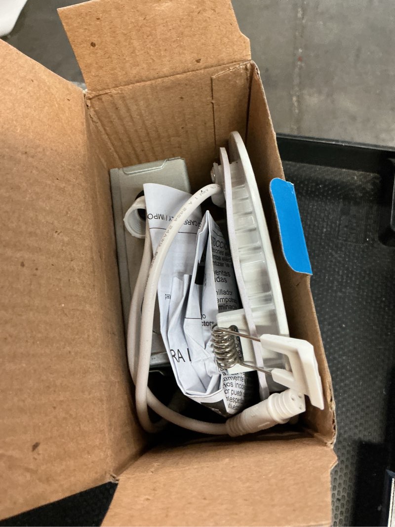 Condition photo showing As Is for utilitech white 4-in 540 -lumens switchable white round dimmable led canless wet rated recessed downlight