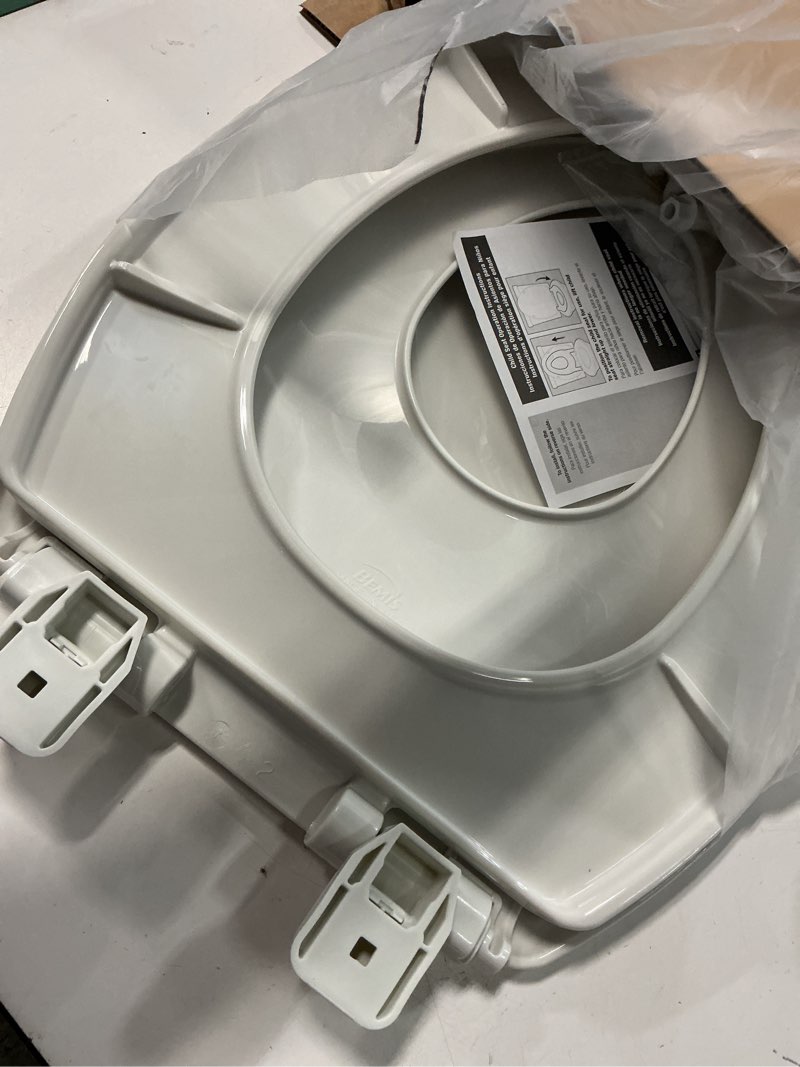 Condition photo showing Good Condition for mayfair little2big? elongated plastic toilet seat in white with sta-tite? seat fastening system? and whisper•close? hinge