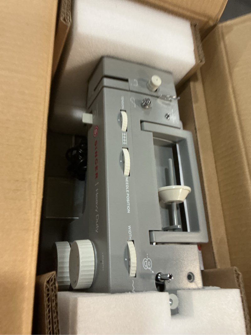 Condition photo showing Good Condition for SINGER Heavy Duty Holiday Bundle - 4452 Heavy Duty Sewing Machine with Extension Table & 2 Presser Feet | Strong Motor, 110 Stitch Applications, Full Metal frame, 1-step Buttonhole & LED Light