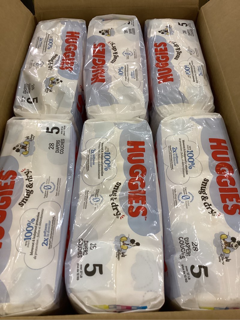 Condition photo showing New/Like New for Huggies Snug & Dry Diapers - Size 5 - 168ct