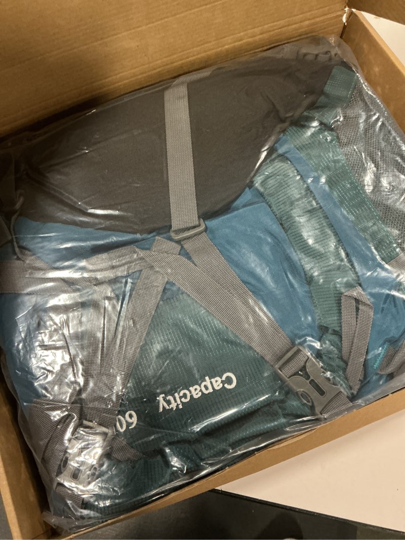 Condition photo showing New/Like New for 60L Hiking Camping Backpack with Rain Cover, Waterproof Large Capacity Outdoor Sport Travel Daypack Climbing Touring Green (color may vary as shown in photo)