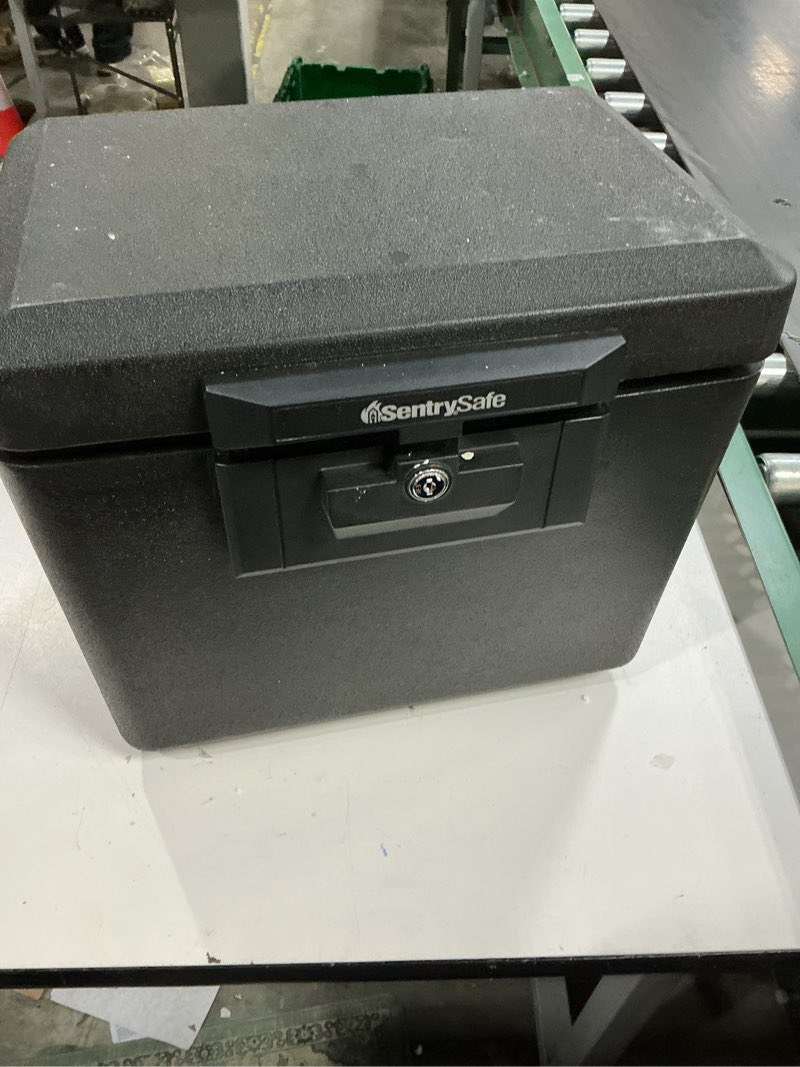 Condition photo showing As Is for sentrysafe 1170 fire-resistant box safe with key lock 0.61 cu. ft.