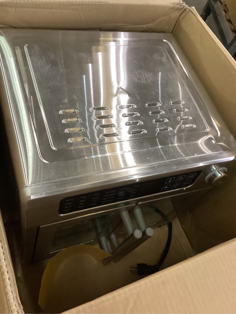 Condition photo showing As Is for Dan - Emeril Lagasse Extra Large French Door Air Fryer Toaster Oven Combo, 24 Cooking Functions and Digital Controls, 7 Accessories Included, Stainless Steel Finish, 26QT Capacity