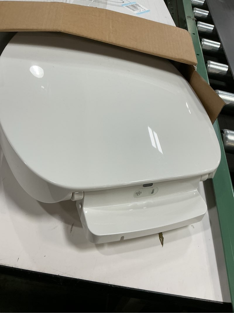 Condition photo showing As Is for KOHLER 10349-0 PureWarmth Heated Elongated Toilet Seat, Soft Close Toilet Seat, Quiet-Close, Slow Close, Night Light, White Elongated White