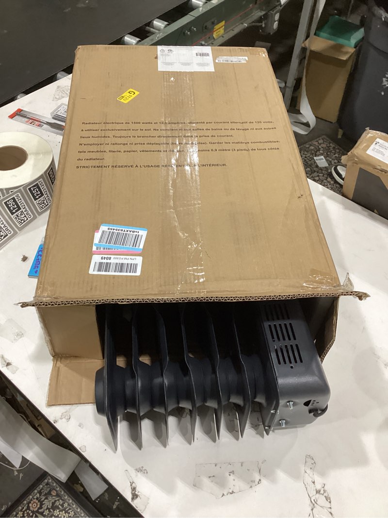 Condition photo showing As Is for Amazon Basics Oil Space Heater, Portable Radiator Heater with 7 Oil-Filled Fins for Indoor Use, 3 Heat Settings, Thermostat, Tip-Over Protection, ETL Safety Certificate, Manual Control, 1500W, Black