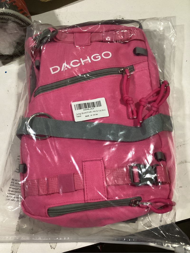 Condition photo showing New/Like New for Ski and Snowboard Harness with Training Leash for Kids - Teach Your Child The Fundamentals of Skiing or Snowboarding Pink Backpack with Traning Leash