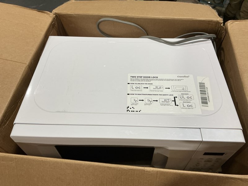 Condition photo showing As Is for COMFEE' EM720CPL-PM Countertop Microwave Oven with Sound On/Off, ECO Mode and Easy One-Touch Buttons, 0.7 Cu Ft/700W, Pearl White 0.7 Cu.Ft White