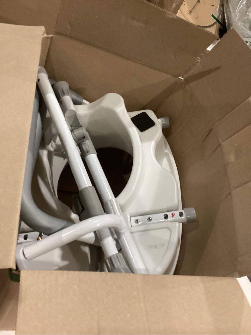 Condition photo showing As Is for raised toilet seat with handles, toilet seat risers for seniors, adjustable padded arms, elevated toilet safety seat