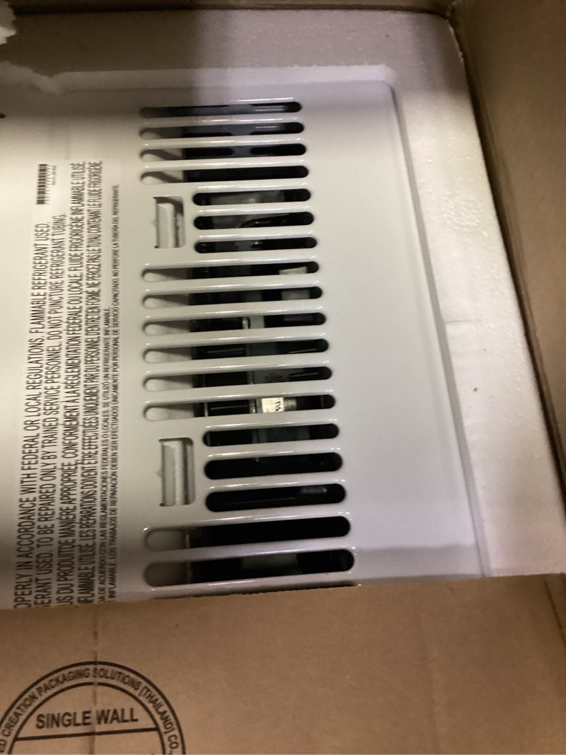 Condition photo showing New/Like New for lg 6,000 btu window air conditioner, cools 250 sq.ft. (10' x 25' room size), quiet operation, electronic control with remote, 2 cooling & fan speeds, 2-way air deflection, auto restart, 115v 6000 btu electronic & standard bright white