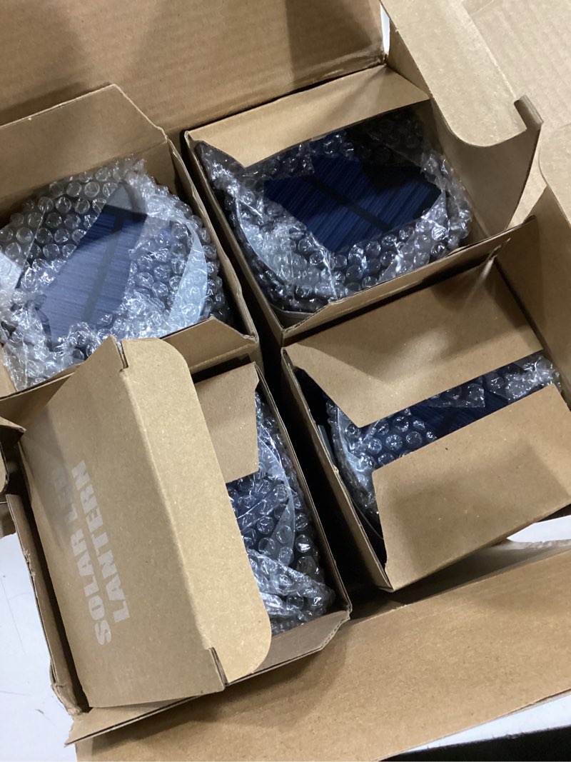 Condition photo showing New/Like New for Lichamp 4-Pack Solar Camping Lantern, USB Rechargeable LED Lanterns Battery Powered Pop Up Flashlight Lamps with Three Modes Power for Power Outages Hurricane Supplies Emergency Indoor & Outdoor