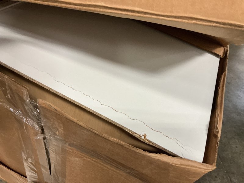 Condition photo showing As Is for courtland polar white finish laminate shaker stock assembled wall kitchen cabinet 36 in. x 18 in. x 24 in.