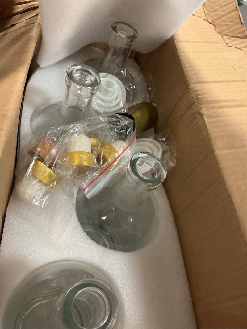 Condition photo showing Good Condition for 33 oz Clear Glass Bottles with Cork, 4 Pack Clear 1000ml Liquor Bottles, Thick Heavy Base Airtight Wine Bottles for Beverages, Liquor, Whiskey, Oil, Vinegar, Wedding Favors & Crafts Clear 33oz/ 1000ml