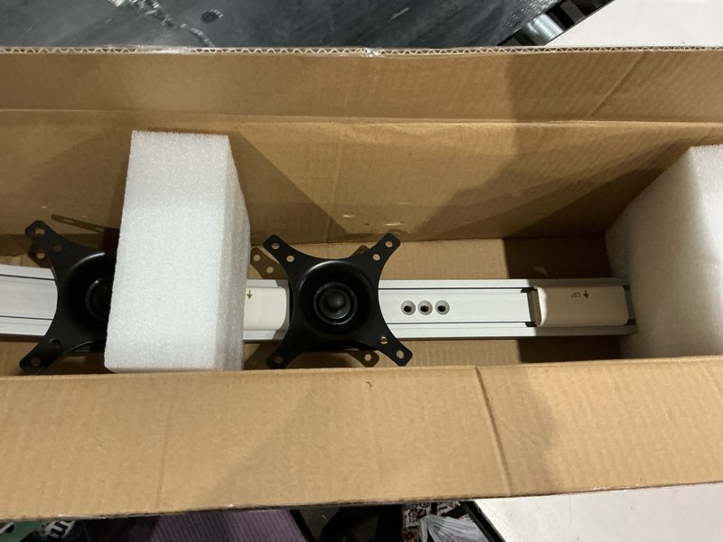 Condition photo showing New/Like New for compatible dual monitor stand silver dual arm