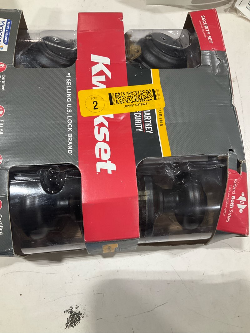 Condition photo showing As Is for kwikset kwikset signatures juno venetian bronze smartkey double-cylinder deadbolt keyed entry door knob