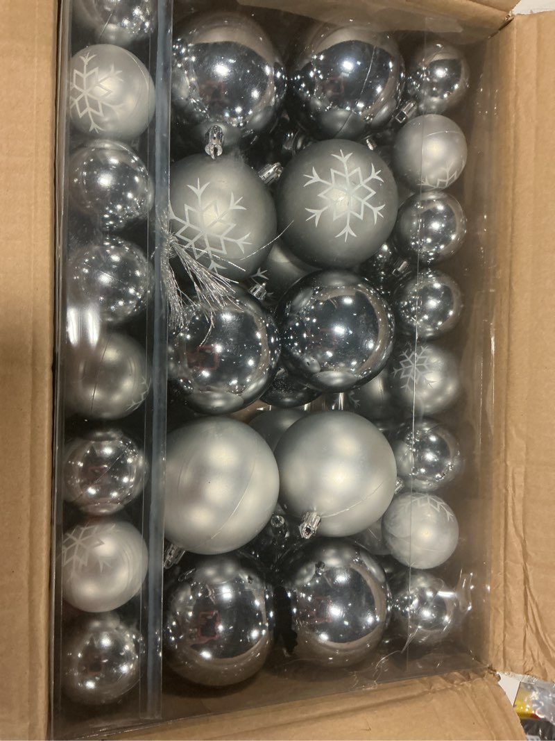 Condition photo showing As Is for big & small shiny and matte silver christmas ball ornaments