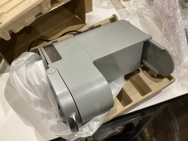 Condition photo showing As Is for keurig k-mini single serve k-cup pod coffee maker, 6 to 12oz brew size, with cord storage, perfect for small spaces, studio gray
