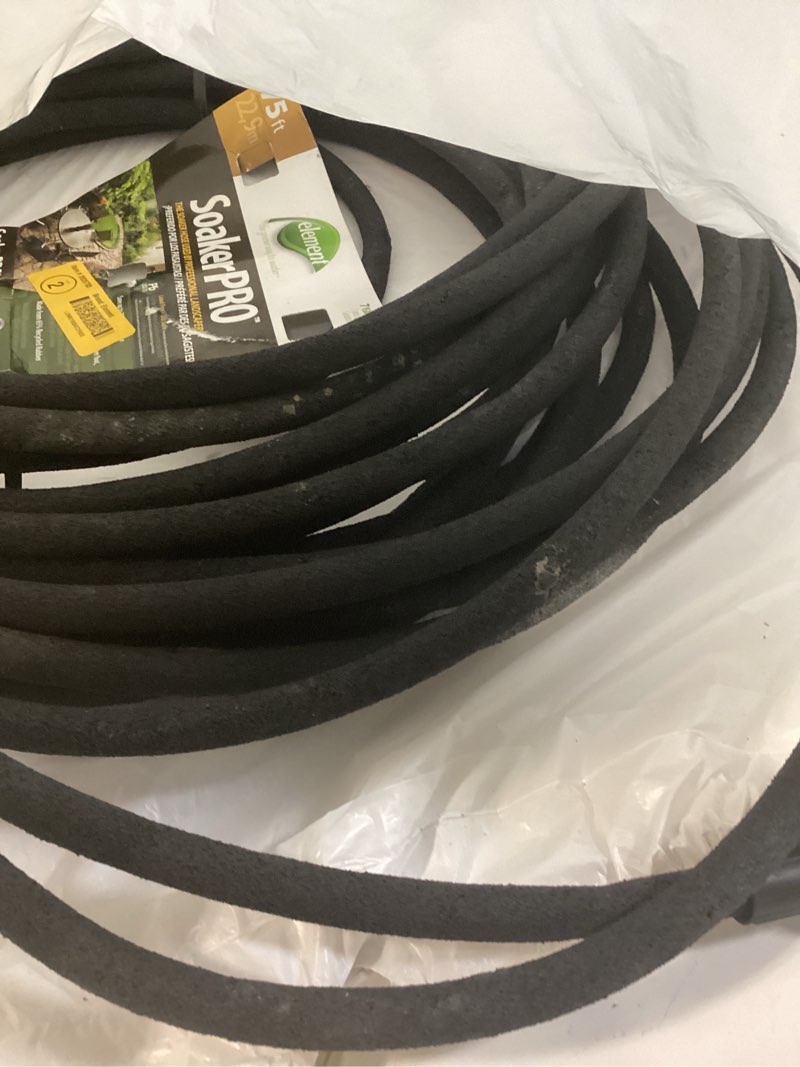 Condition photo showing As Is for element soaker 3/8" x 75' garden hose