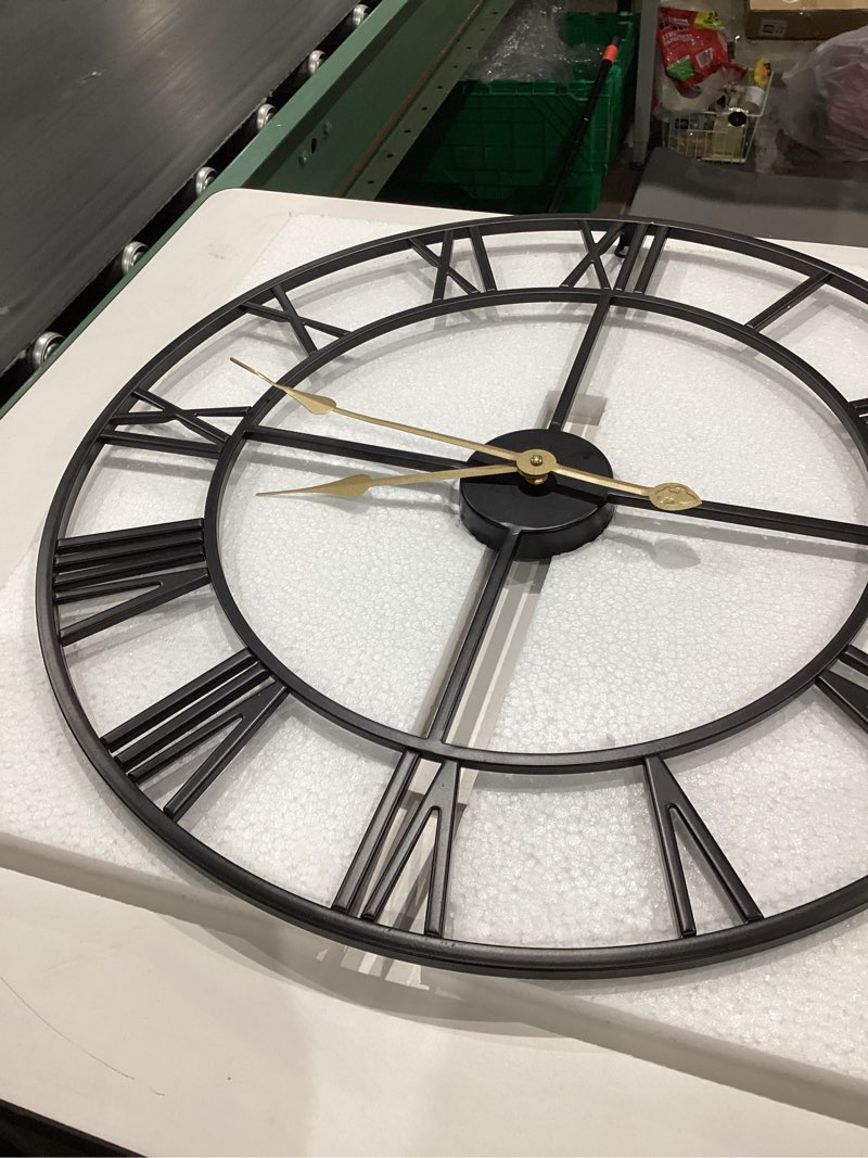Condition photo showing As Is for leike large wall clock, 24" completely silent, non ticking, battery-operated,rustic round modern metal wall clock decor for living room, bedroom and kitchen, (60cm, black-roman number) 24 inch black-roman number