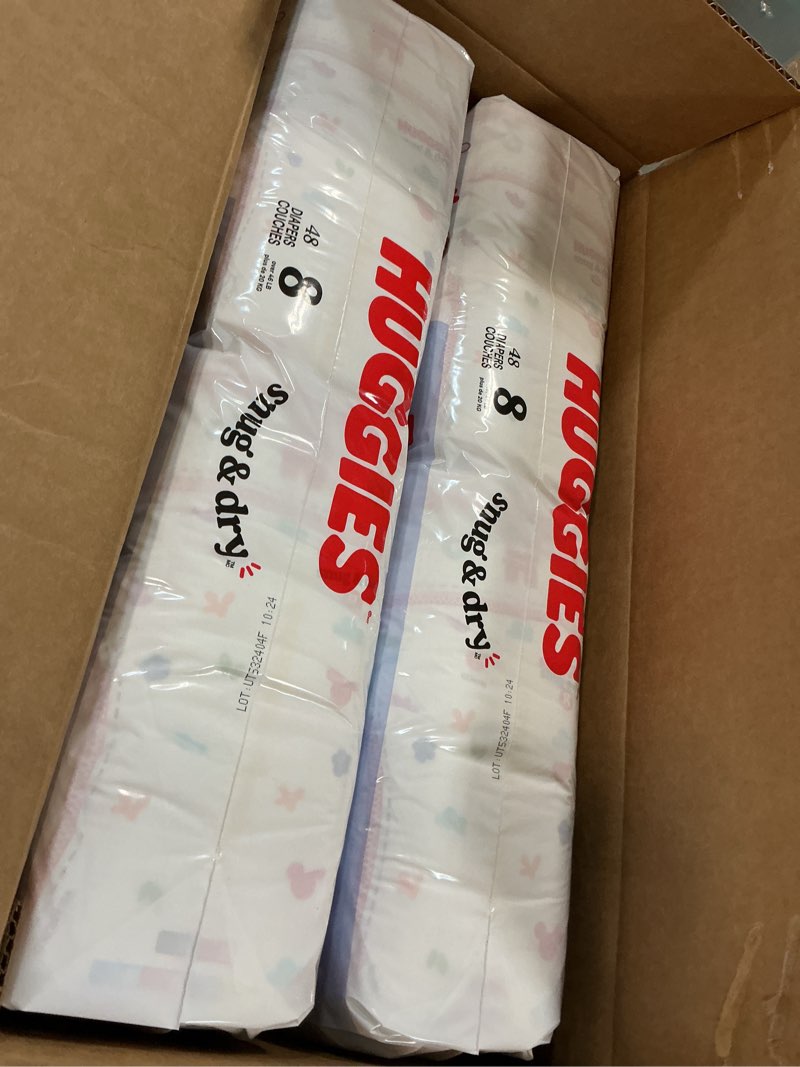 Condition photo showing New/Like New for Huggies Size 8 Diapers, Snug & Dry Baby Diapers, Size 8 (46+ lbs), 96 Count (2 Packs of 48), Packaging May Vary