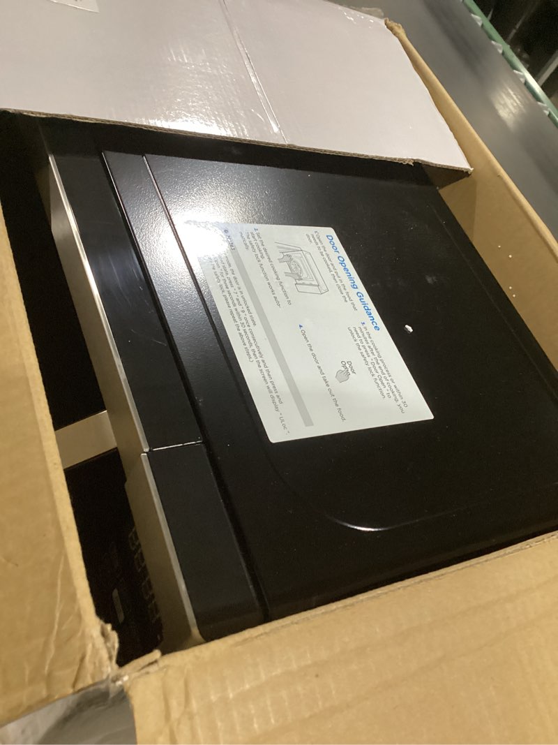 Condition photo showing As Is for Farberware 0.7 Cu. Ft. Countertop Microwave Oven – 700 Watts Power, Auto Cook Settings, Defrost, Easy Clean and Child Safety Lock - Stainless 0.7 Cu. Ft. Stainless Steel