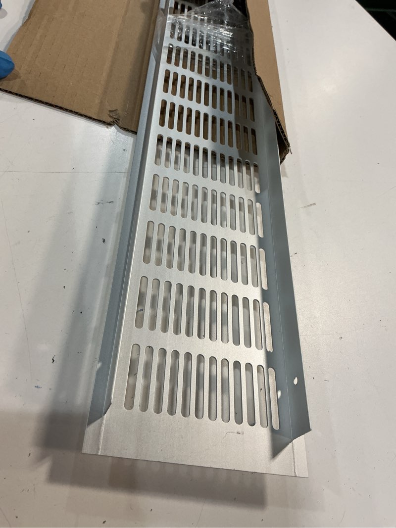 Condition photo showing Good Condition for patikil 24 x 4 inch door air vent cover, 1 pcs heavy duty aluminum grille ventilation cover louvered with mounting screws for cabinet wardrobe door, silver