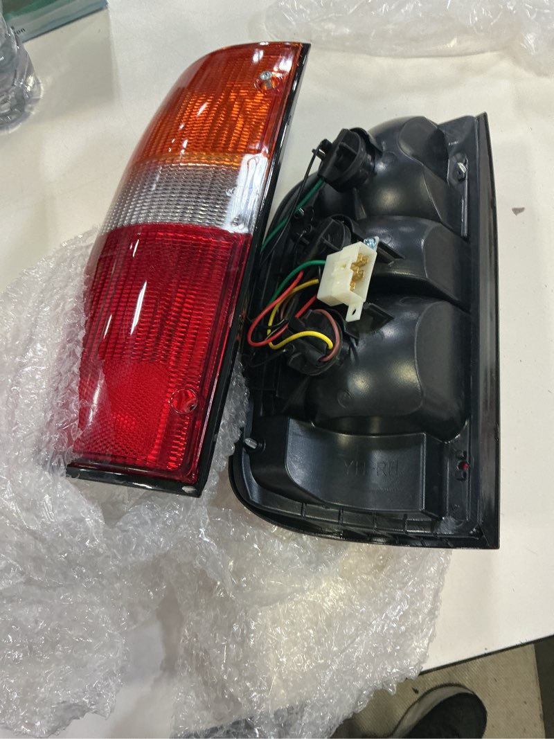 Condition photo showing As Is for labwork tail lights assemblies replacement for toyota tacoma pickup truck 2001-2004 rear brake lamps left driver and right passenger side 8156004060 to2800139