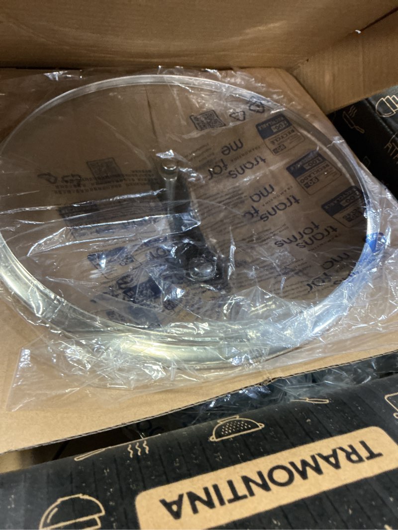 Condition photo showing New/Like New for tramontina gourmet 5-quart steamer set, tri-ply base stainless steel dutch oven with steamer insert and glass lid, induction-ready