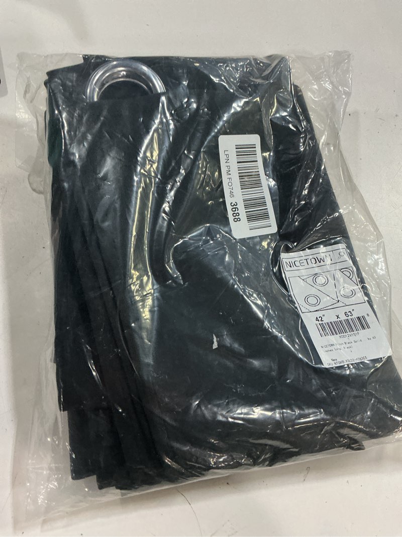 Condition photo showing New/Like New for nicetown pitch black solid thermal insulated grommet blackout curtains/drapes for bedroom window (2 panels, 42 inches wide by 63 inches long, black) black 42"w x 63"l (pack of 2)