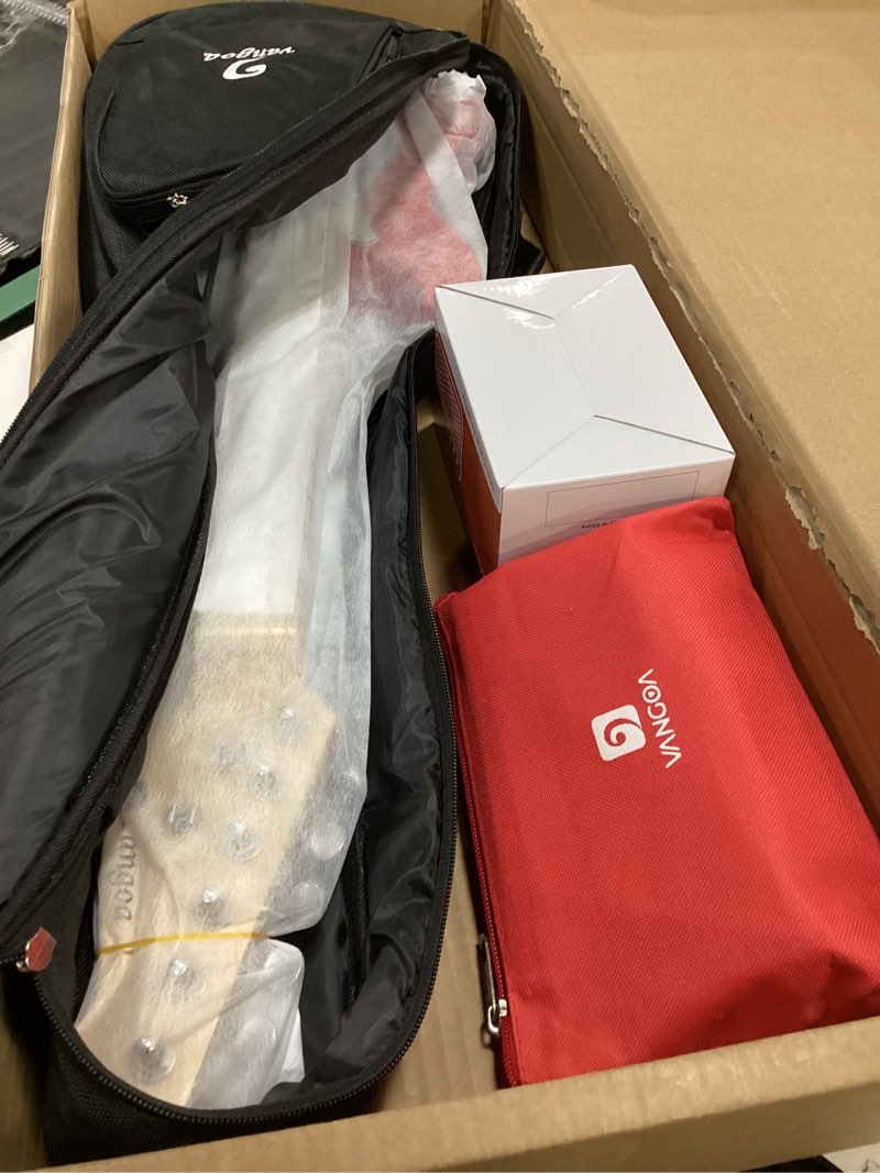 Condition photo showing Good Condition for Kids Electric Guitar Vangoa 30 Inch Electric Guitar for Beginner Kit for Young Players with Amp, Bag, Strap, Extra Strings, Capo, Tuner, Picks, Cable (Red)