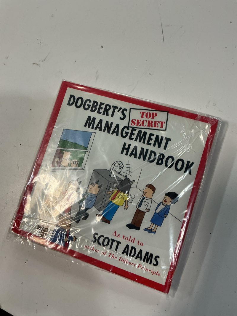 Condition photo showing New/Like New for dogbert's top secret management handbook