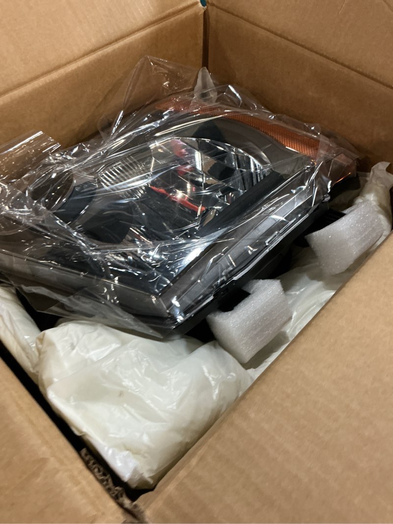 Condition photo showing Good Condition for pair halogen headlights w/o blubs compatible with xterra 2005-2015 headlamp driver & passenger side 26060ea025 26010ea025 black housing yellow corner