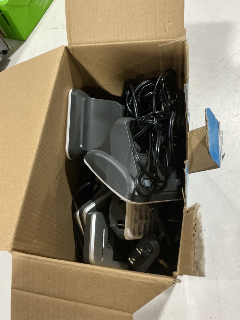 Condition photo showing As Is for at&t 4-handset cordless phone with unsurpassed range  answering system and call block  el52429 (white/silver)