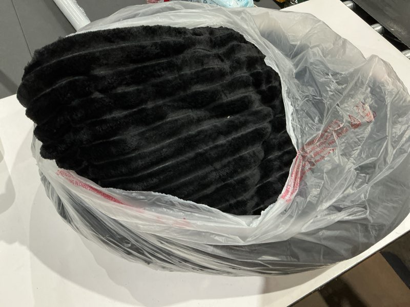 Condition photo showing As Is for black blanket