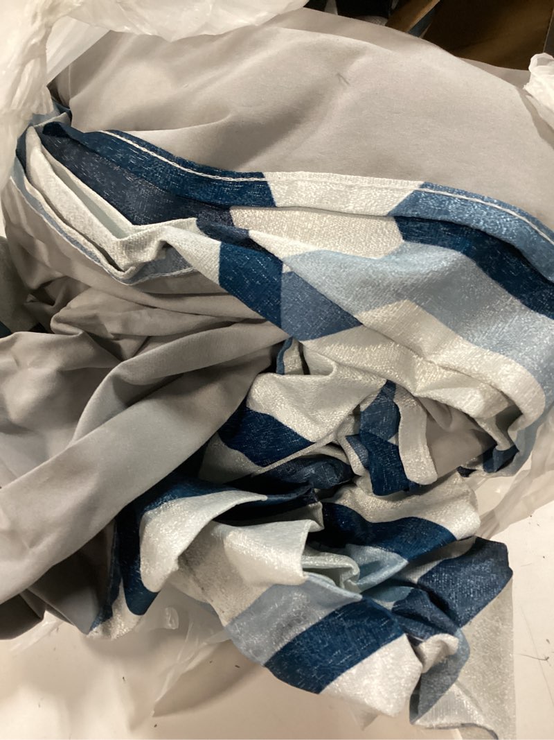 Condition photo showing Good Condition for sun zero arlo 2-piece textured thermal insulated room darkening grommet curtain panel pair  blue geometric  40 w x 84 l