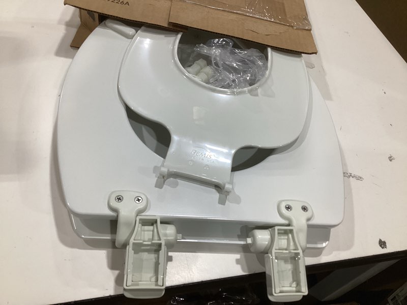 Condition photo showing As Is for mayfair nextstep2 toilet seat with built-in potty training seat, slow-close, removable that will never loosen, elongated, white elongated 1
