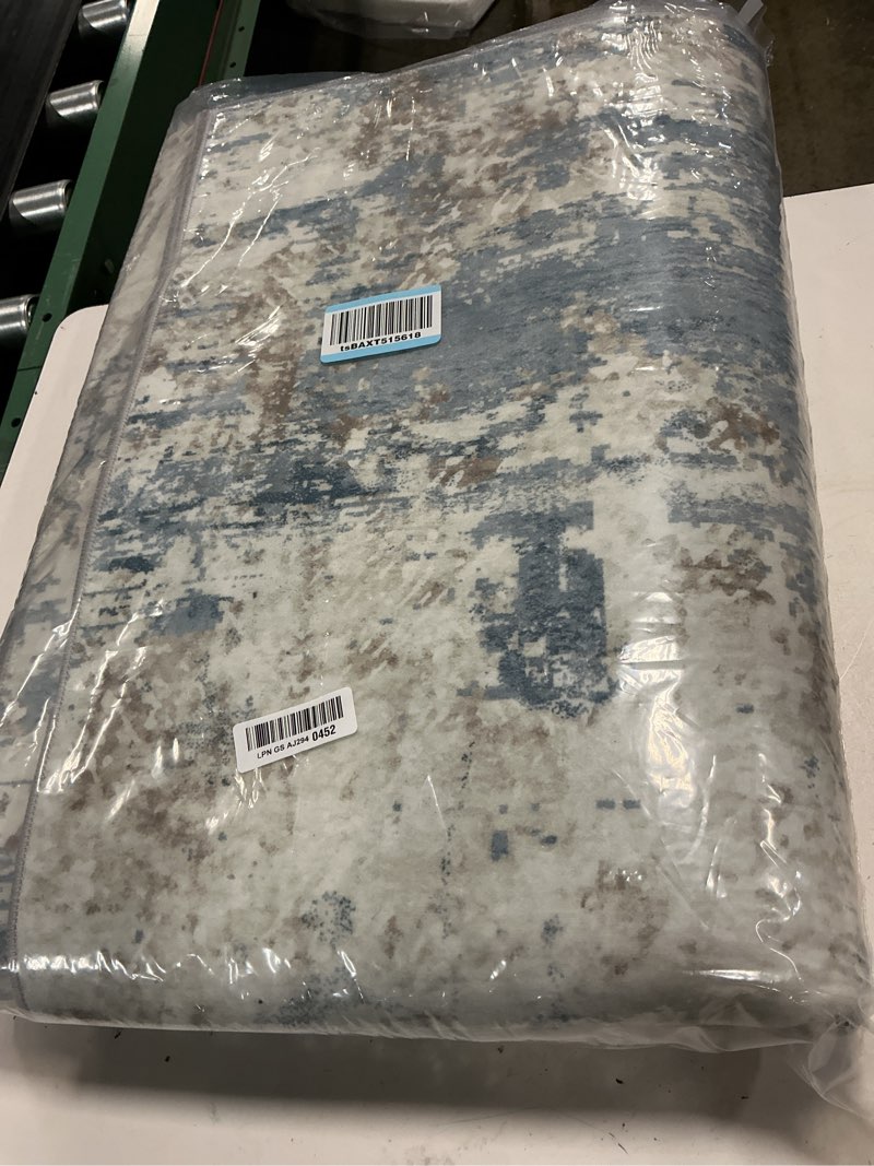 Condition photo showing New/Like New for xluez 6x9 area rugs for living room, washable modern abstract large area rug neutral soft non slip kids rug stain resistant indoor carpet for bedroom nursery dining room playroom(blue, 6'x9')