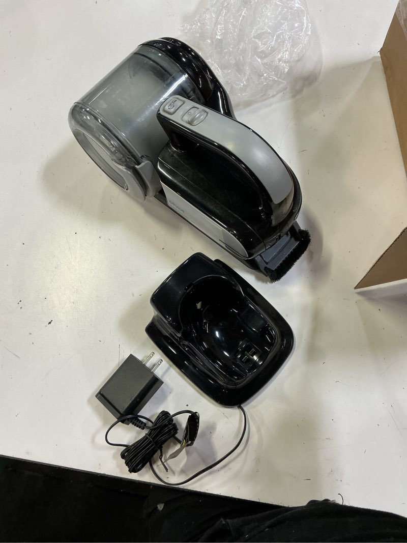 Condition photo showing As Is for black+decker dust buster pivot vac handheld vacuum cordless, car vacuum portable rechargeable, extendible crevice tool and 200 degree pivoting nozzle, strong suction, lightweight (bdh2000pl)