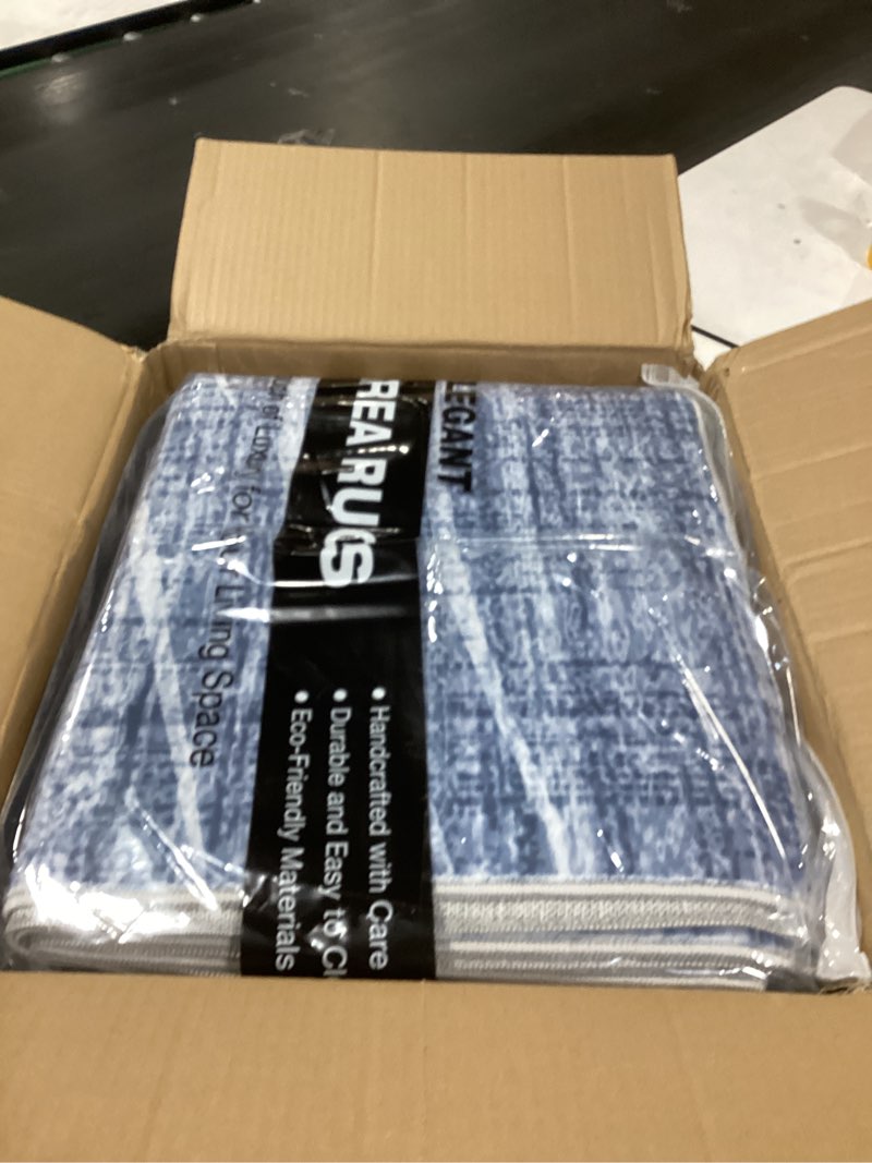 Condition photo showing New/Like New for WITSHOCK Washable Rugs 8x10 Modern Area Rugs, Thin Rug for Living Bedroom Dining Room Nursery Kitchen Office, Wave Striped Rugs Indoor Carpet Soft Non Slip Stain Resistant Home Decor, Blue 8' x 10' (Rectangular) Blue