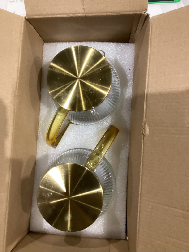 Condition photo showing New/Like New for 2 PACK Glass Pitcher with Lid, 68 oz/ 2 Liter Classic Vertical Stripes Water Pitcher with Handle,Glass Water Carafe for Cold Brew, Coffee, Lemonade, Iced Sun Tea,Beverage,Heat Resistant