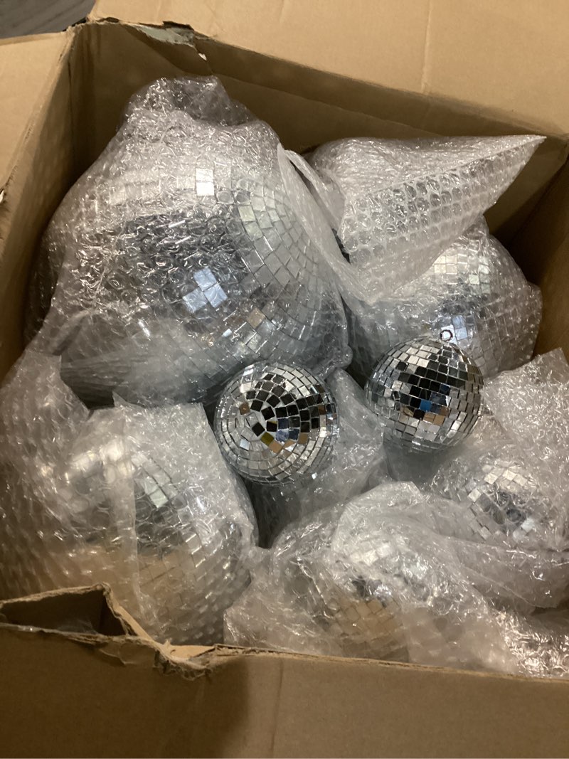 Condition photo showing Good Condition for Libima 12 Pack Large Christmas Disco Ball Decoration Different Sizes Silver Mirror Hang Disco Ball Ornaments for Christmas Tree Birthday Wedding Holiday Party Favors Prom Props(8'', 6'', 4'', 3'')