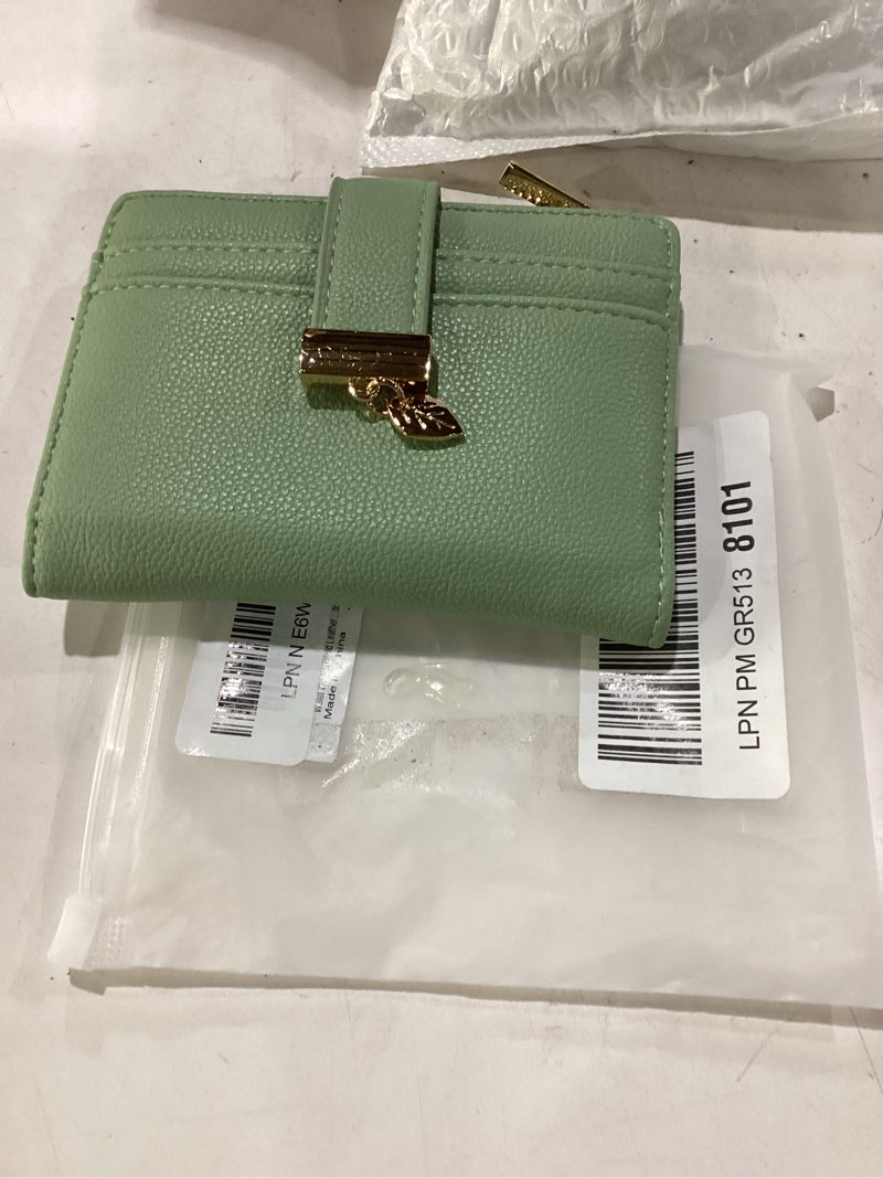 Condition photo showing New/Like New for pomelo best small wallet women rfid blocking bifold soft leather card holder with id window zipper coin pocket wallets for women green