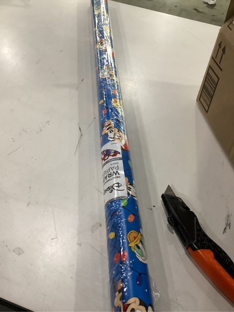 Condition photo showing New/Like New for American Greetings Disney Christmas Wrapping Paper Roll with Mickey, Red and Blue Holiday Gift Wrap (40 sq. ft., 1 Reversible Roll-30 in. x 16 ft.) Mickey Mouse, Minnie Mouse, Goofy Donald Duck, Pluto