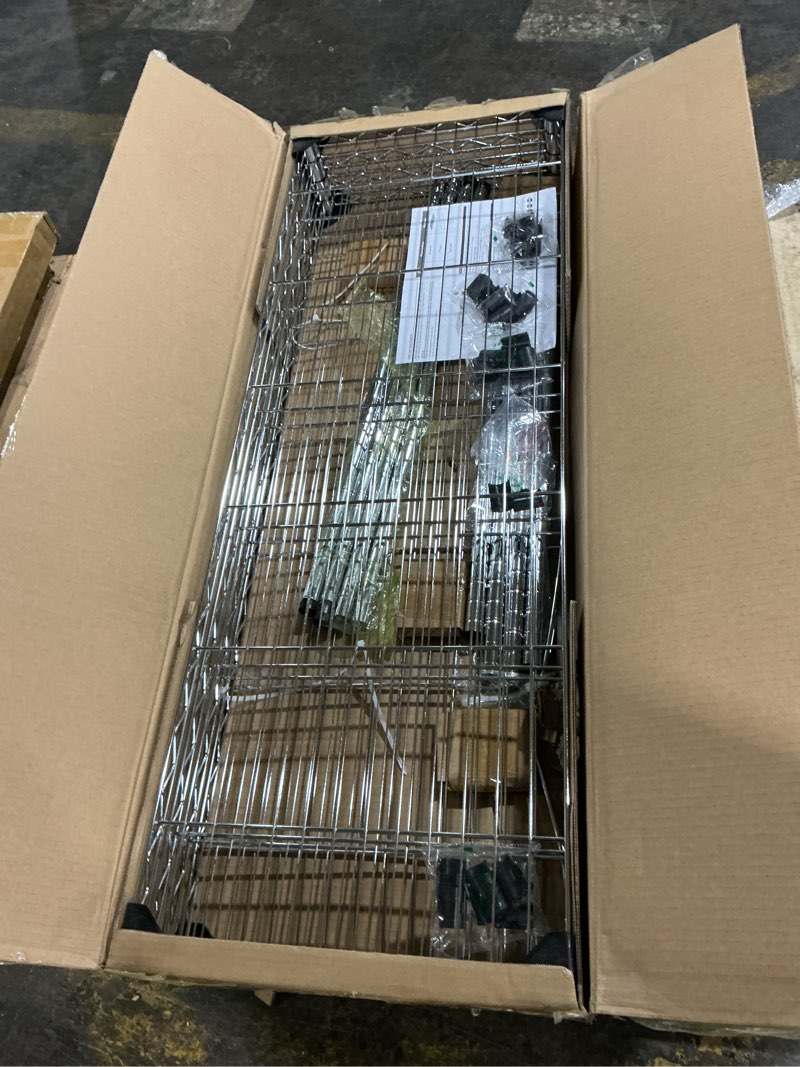 Condition photo showing Good Condition for 1400 lbs 4 Tier Storage Rack Metal Wire Shelving Unit, Storage Standing Household Shelf Organizer for Kitchen Pantry Closet Garage Basement Utility Room, Chrome 15.8" D x 45.3" W x 59.4" H 4 tier 15.8" D x 45.3" W x 59.4" H Chrome