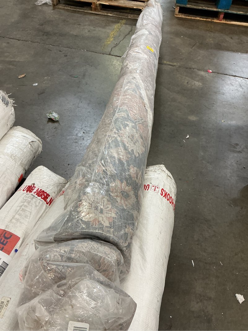 Condition photo showing As Is for multi colored area rug 9’x12’11